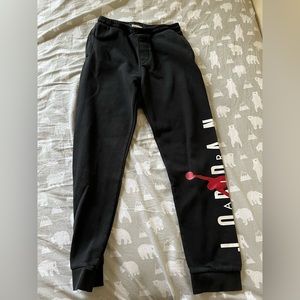 Boy XL (13-15) Sports pants / jogger from Nike Jordan in color black